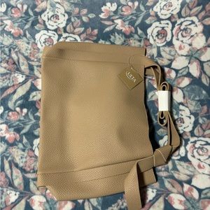 never used brand new tan ulta bag